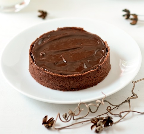 Tartelette de caramelo, nozes e chocolate